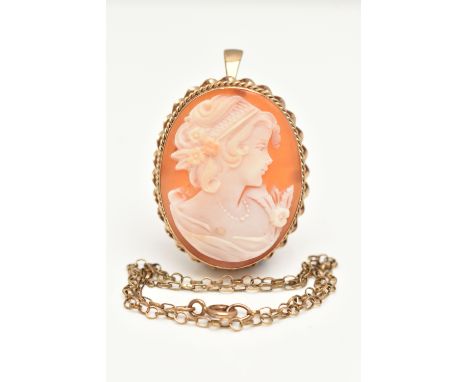 A 9CT GOLD CAMEO BROOCH PENDANT AND A YELLOW METAL BRACELET, a shell cameo depicting the portrait of a lady, collet set in ye