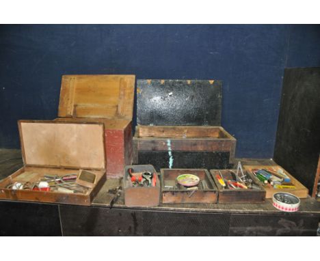 TWO WOODEN TOOL CHESTS CONTAINING ENGINEERING AND CARPENTRY TOOLS, including taps, reamers, calipers, files, pliers, snips, a