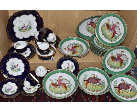 A PART DESSERT SERVICE AND A CROWN STAFFORDSHIRE TEA SET IN 'CHELSEA BIRDS' PATTERNS, the fourteen piece part dessert service