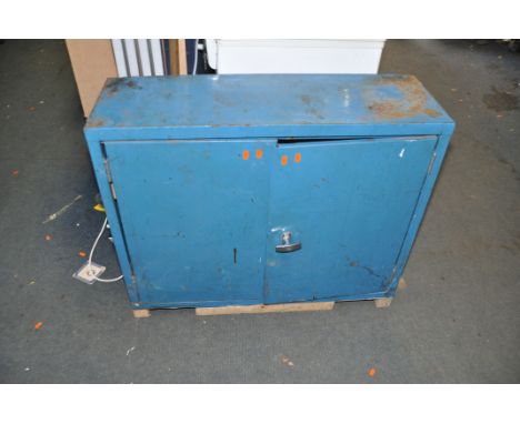 A METAL WORKSHOP CABINET, with two doors concealing one shelf width 92cm x depth 30cm x height 75cm (with adapted foot)