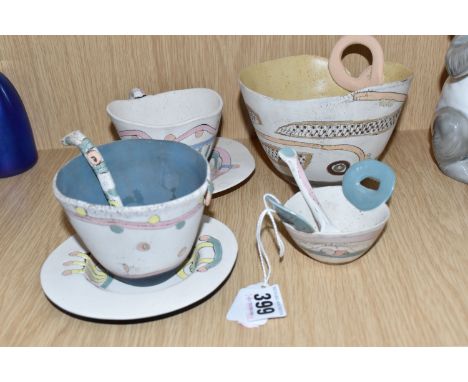 A GROUP OF CAROL PEEVOR STUDIO POTTERY comprising eight hand-built items to include a cup (signed by the artist and dated 199