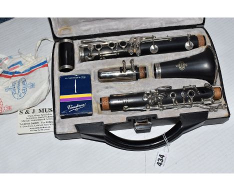 A BUFFET CRAMPON AND CO PARIS B12 CLARINET in a Buffet Crampon hard case to include all parts and a box of Vandoren reeds (un