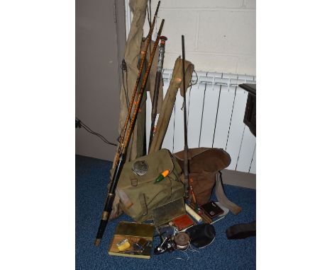 A GROUP OF FISHING RODS, REELS AND ACCESSORIES, to include a wooden fishing reel, two unmarked metal reels and a Daiwa 725ORL