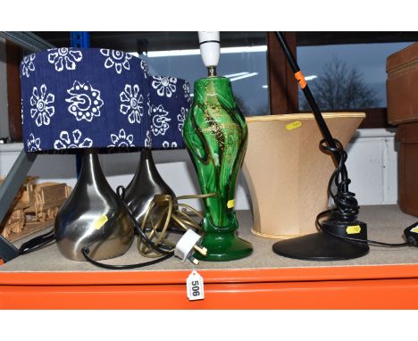 A GROUP OF FOUR TABLE LAMPS, comprising a green art glass table lamp, decorated with a white, black and gold abstract design,