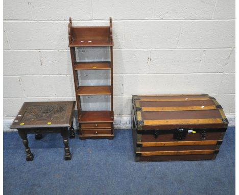 A CANVASS AND WOODEN BANDED DOMED TRUNK, with twin metal handles, width 70cm x depth 44cm x height 47cm, a slim open shelving
