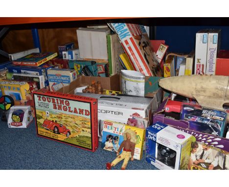 SEVEN BOXES AND LOOSE TOYS, GAMES AND PUZZLES, vintage and modern items, to include a metal hull of a pond yacht, remote cont