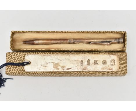 A SILVER PENCIL AND BOOKMARK, the pencil with engine turned case, twist mechanism, hallmark for Birmingham 1962, together wit