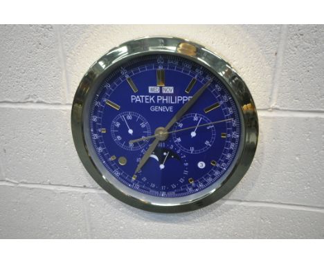 A PATEK PHILIPPE GENEVE DEALERS ADVERTISING WALL CLOCK, with a blue dial, diameter 40cm (condition report: untested, overall 