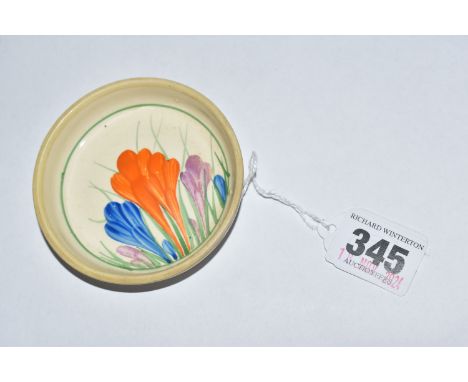 A CLARICE CLIFF 'CROCUS' PATTERN PIN DISH, painted with orange, blue and purple crocus flowers, printed Bizarre Newport Potte