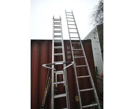 TWO SETS OF DOUBLE EXTENSION LADDERS, the largest with 17 rungs to each length, closed length 500cm, the smaller set with fif