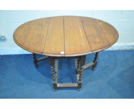 A 20TH CENTURY OAK BARLEY TWIST GATE LEG TABLE, open width 121cm x closed width  depth 92cm x height 75cm (condition report: 
