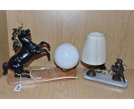 TWO ART DECO TABLE LAMPS, one with a painted metal figure of a rearing horse, with spherical white glass shade, surmounting a