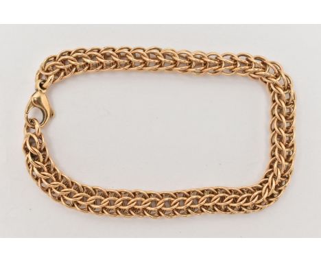 A HEAVY 9CT GOLD FANCY LINK BRACELET, fitted with a lobster clasp, hallmarked 9ct Birmingham, length 190mm, approximate gross