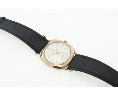 A 9ct ACCURIST gents wristwatch, manual-wind 21 jewel movement, on a black leather strap, H/M Edinburgh 1952, working, 