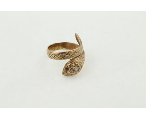 A 9ct H/M ruby & diamond  snake ring, the round brilliant cut diamond approx 0.10ct, size T, approx weight 7.9gms