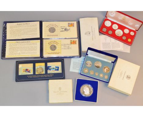 A quantity of coins to include a Commonwealth of the Bahamas coin set, a Coinage of Belize, Franklin mint, sterling silver pr