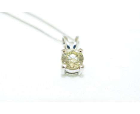 An 18ct H/M single diamond pendent and chain, the round brilliant-cut diamond approx 0.73ct