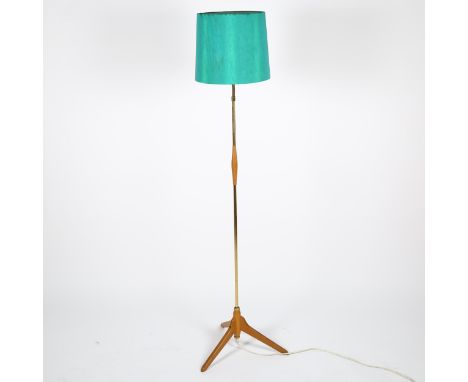 ORSJO Lighting, a 1950s' oak and brass standard lamp, with adjustable top and original shade, height to fitting 125cmGood con