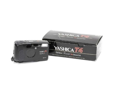 Yashica T4 Compact Camera  no.599009 with Carl Zeiss T* Tessar f3.5 35mm lens, in original box   Cosmetically Excellent; lens