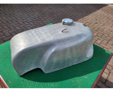 A Manx style hand crafted alloy petrol tank, un-polished natural worked finish, with top breather tube, Monza style filler ca