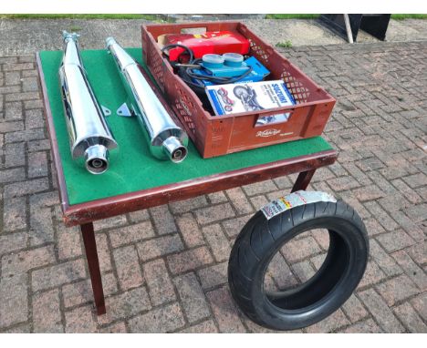 A pair of new chromed steel Busso 660mm silencers for a classic bike, an unused 150/70/15 Bridgestone tyre, a Gunson Colortun