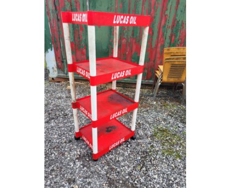 A four tier Lucas Oils stand. Approximately 136cm x 60cm x 44cm. Will dismantle for transporting. (1 item)