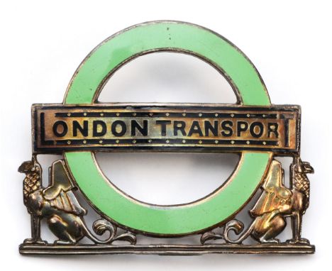 London Transport, a silver and green enamel County Buses and Coaches cap badge, by J.R. Gaunt, Birmingham 1958, numbered 2973
