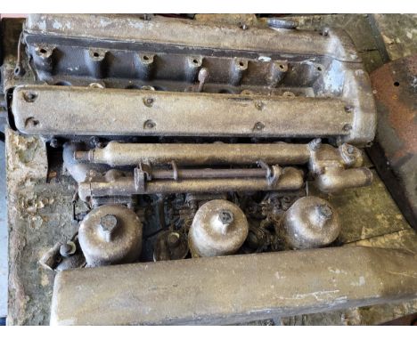 Jaguar SP Type Cylinder Head, from a six cylinder (XK type) engine. Complete with intake manifold and triple SU Carburettors.