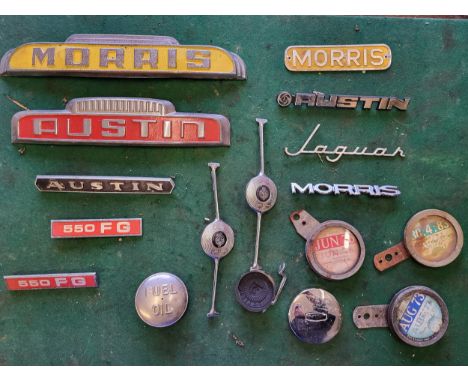 A box of car badges, including Austin, Morris, Jaguar. (1 box)