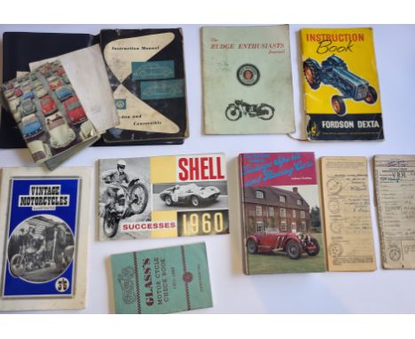 Motoring Literature, including a 1964 Volkswagen Beetle owners pack (some water damage), two buff logbooks (Royal Enfield 500