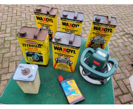 A quantity of cans of Waxoyl and Tetrosyl rustproofing fluid, and a rotary car polishing machine, boxed with bonnets and mops