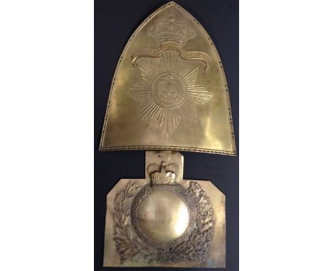 A Prussian brass shield shaped grenadier mutze helmet plate, embossed with insignia and mottoes Semper Talis and Suum Cuicue,