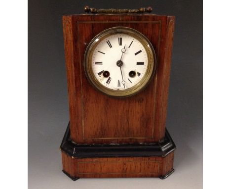 A 19th century rosewood carriage or mantel clock, 7cm circular enamel dial inscribed Hamelin a Paris, Roman numerals, twin wi