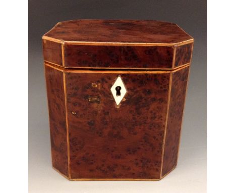 A small George III burr yew canted rectangular tea caddy, hinged cover, Ivory kite shaped escutcheon, outlined throughout wit