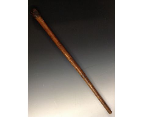 Folk Art - an early 20th century walking-stick, inscribed H. Gore and dated 1938, profusely carved and picked out throughout 