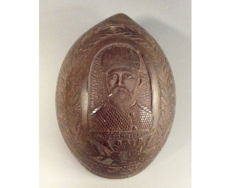 The Thousand Days War, Columbia - a treen coconut drinking bowl, carved in relief with a named portrait of General Benjamin H