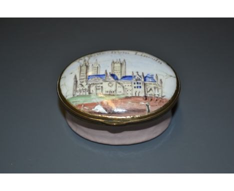 A George III South Staffordshire enamel oval patch box, the hinged cover inscribed A Trifle from Lincoln and painted with a v