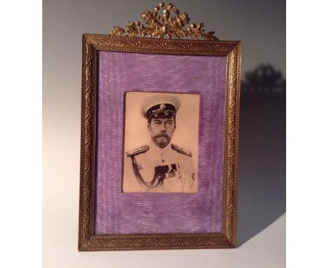 A Louis XVI Revival rectangular photograph frame, containing a bust-length portrait of Nicholas II of Russia within a watered