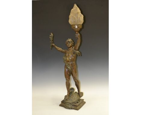 Louis Moreau, after, a cold painted figural table lamp, cast as Primax, he stands raising aloft a torch and laurel branch, fr