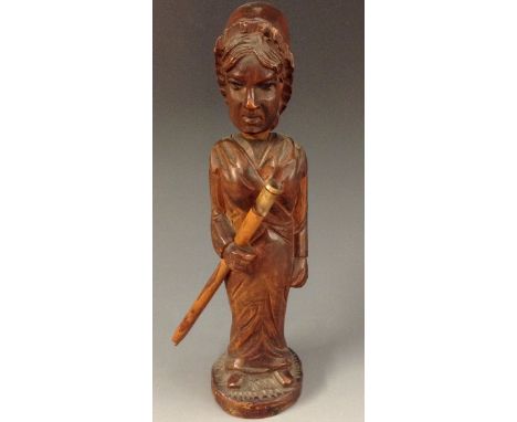 A Black Forest/Tyrolean standing figure pipe, carved as a lady wearing a long dress and bonnet, 18cm high, c.1870