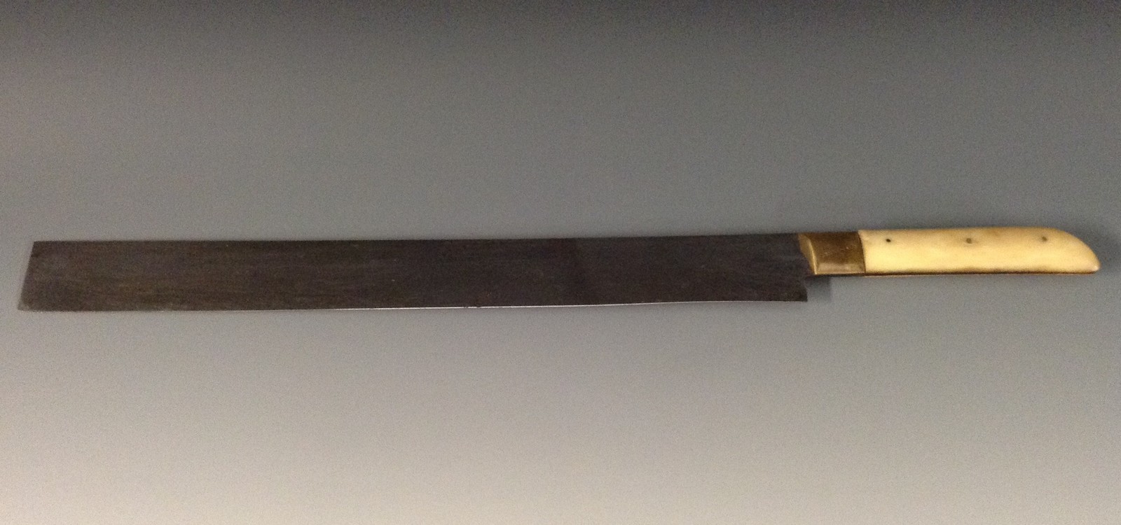 Judaica a kosher ritual slaughter knife, by Grunewald (Berlin), 36cm blade, brass ferrule, two