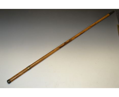 A George III malacca sword stick, 86cm blade chased with leafy scrolls, gilt metal ferule and pommel, 111cm long, c. 1790