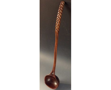 Treen - a 19th century ladle, gently curved stem carved as woven strands, deep oval bowl, 37cm long 