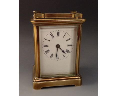A French lacquered brass five glass carriage timepiece, rectangular 5cm enamel dial inscribed with Roman numerals, platform e