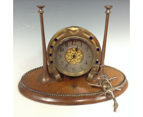 A novelty Huntsman mantel clock, the 8.5cm silvered dial with Arabic numerals, the movement marks  R & Co., the drum case mou