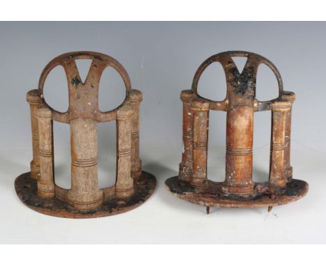 A pair of late 19th century cast iron bridle racks by Musgrave of Belfast, height 21.5cm, another pair of cast iron bridle ra