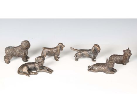 A group of six modern patinated cast bronze models of dogs, including a standing English sheepdog, length 12cm, together with