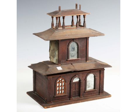 A 19th century wooden tea caddy in the form of a pagoda style building, the hinged lid with upper superstructure, enclosing b