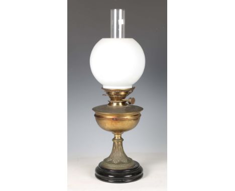 A late Victorian brass table oil lamp, the burner winder detailed 'No 1 Hinks Safety', height 49cm.Buyer’s Premium 29.4% (inc