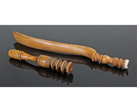 Elegant beech and bone knitting stick together with a finely turned boxwood sewing companion. The stick 25cm long. (2)